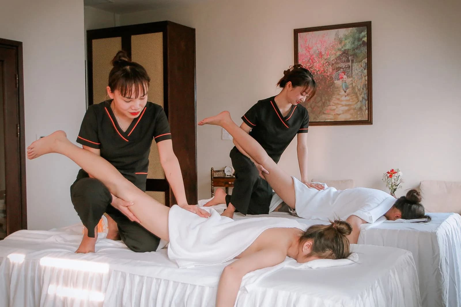Therapist giving a relaxing massage treatment in a serene Malta spa