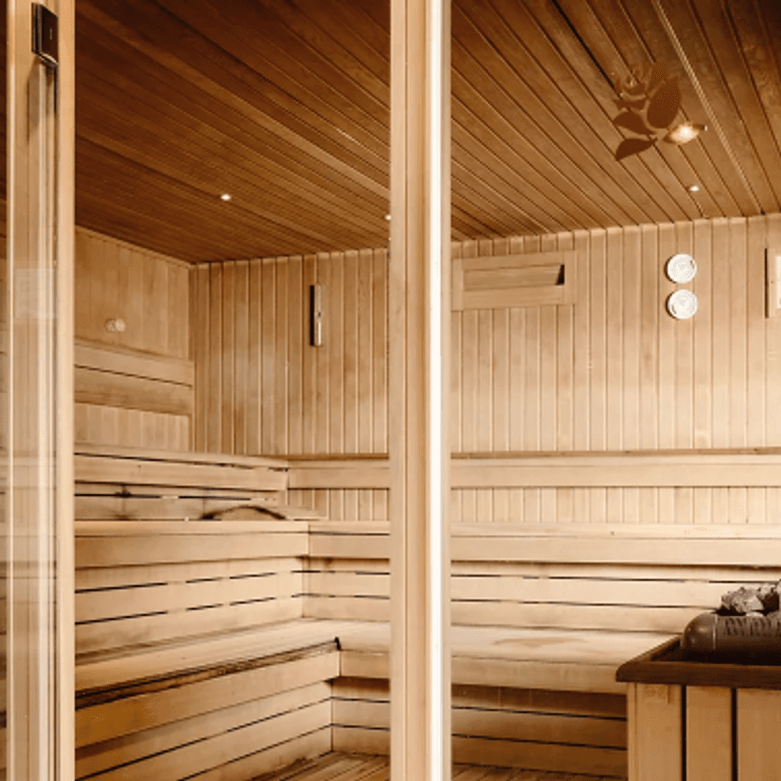 The soft cedar light inside a Carisma Spa sauna