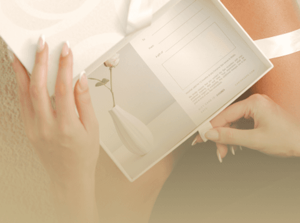 Personalised Carisma Spa corporate gift voucher box with a rose, spa gift cards in Malta